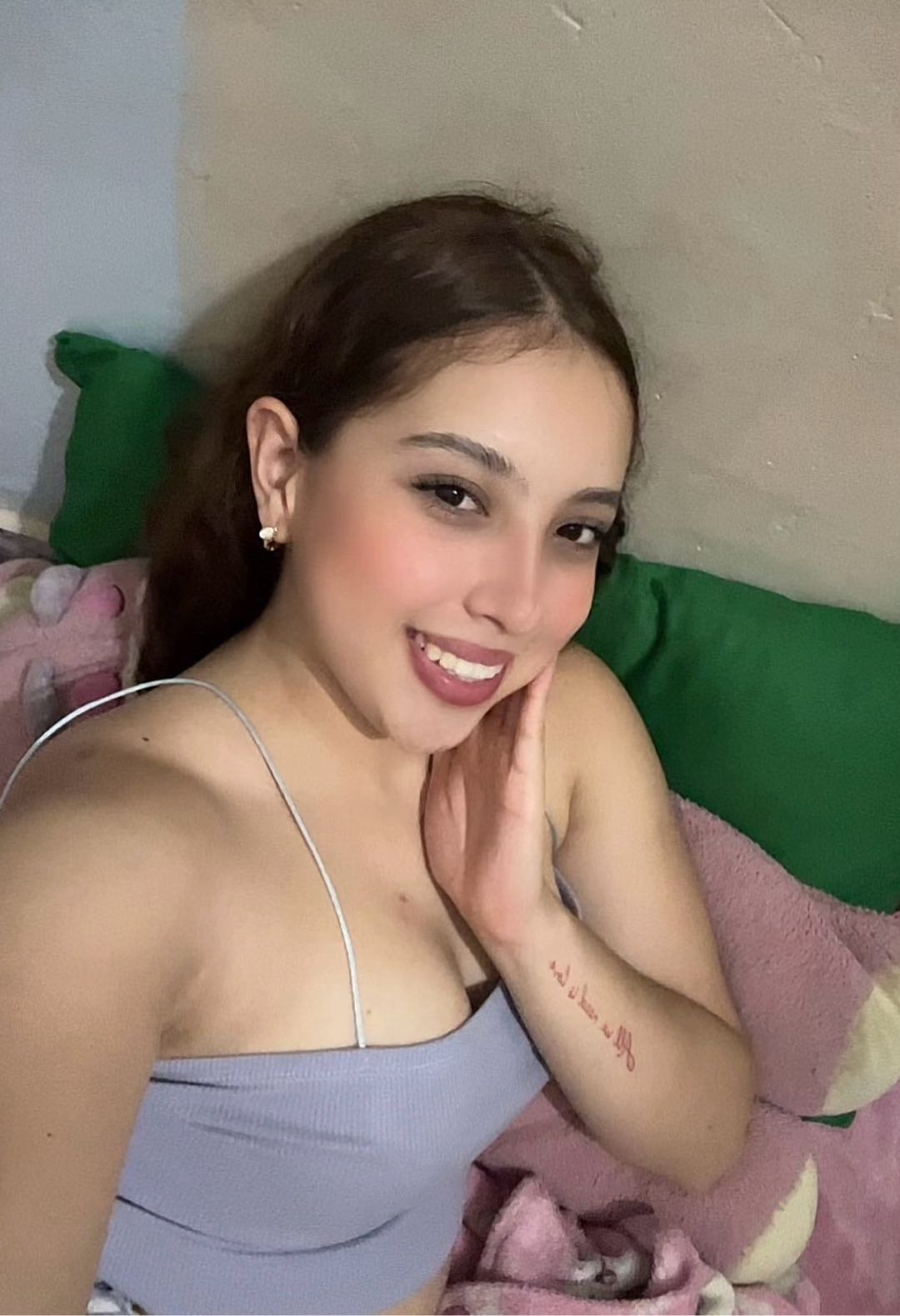 Woman with a playful expression during a video chat